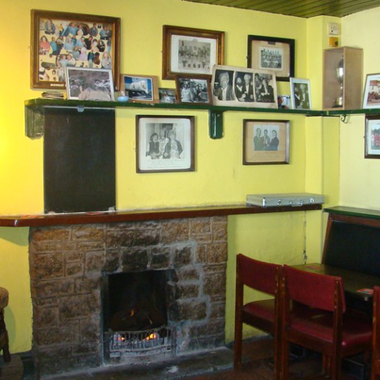 a large red chair in a room