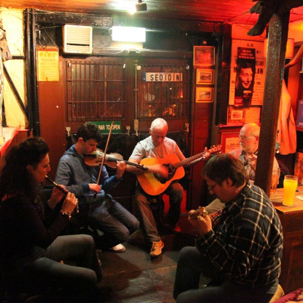 a group of people sitting in a restaurant