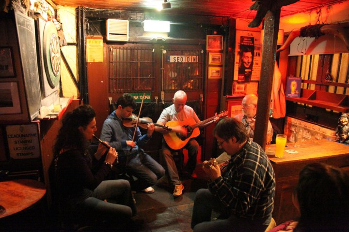 a group of people sitting in a restaurant
