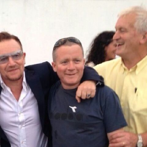 a group of people posing for the camera