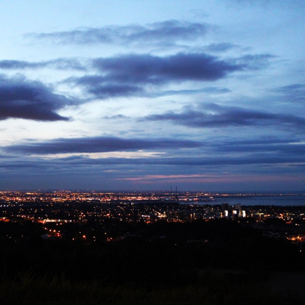 a view of a city at sunset
