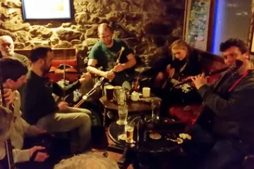 a group of people sitting at a table