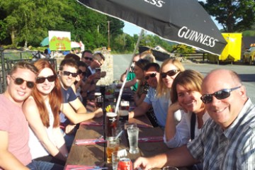 a group of people sitting at a table